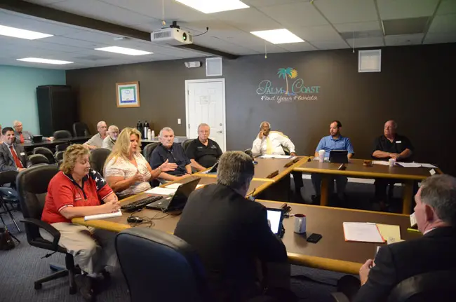 Kimberle Weeks, in the white shirt, and the Palm Coast City Council were not that far apart, but the council ended up making generous concessions to the supervisor of elections for coming elections. (© FlaglerLive)