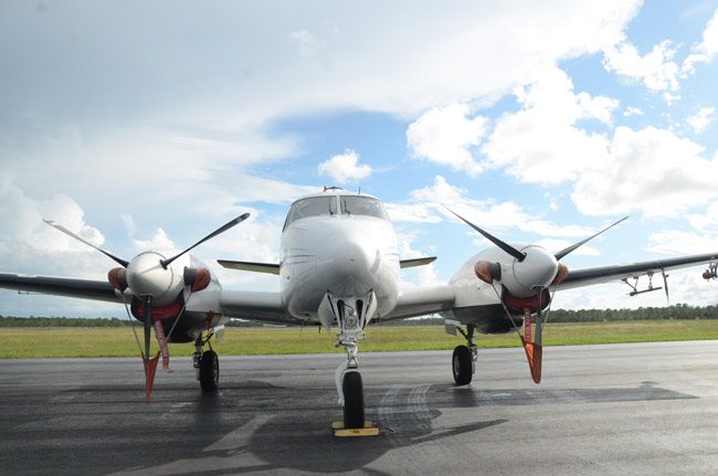One of the two Clarke Mosquito Control turboprop planes that will fly over Flagler over the next two nights was parked at the Flagler County Executive Airport late this afternoon. A second was joining it at 6:30 p.m. (© FlaglerLive)