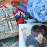 A makeshift memorial for Charlie Kirk outside the headquarters of Turning Point USA in Phoenix.