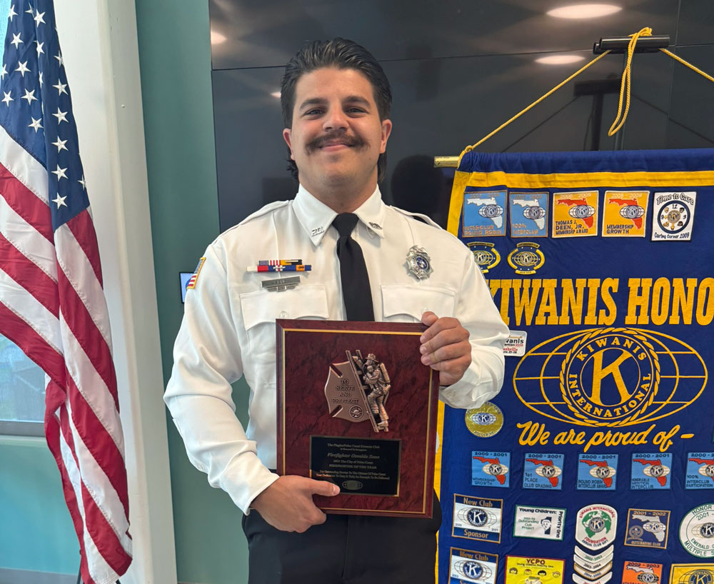 Osvaldo “Ozzy” Sene receiving the 2025 Firefighter of the Year award. (Palm Coast)