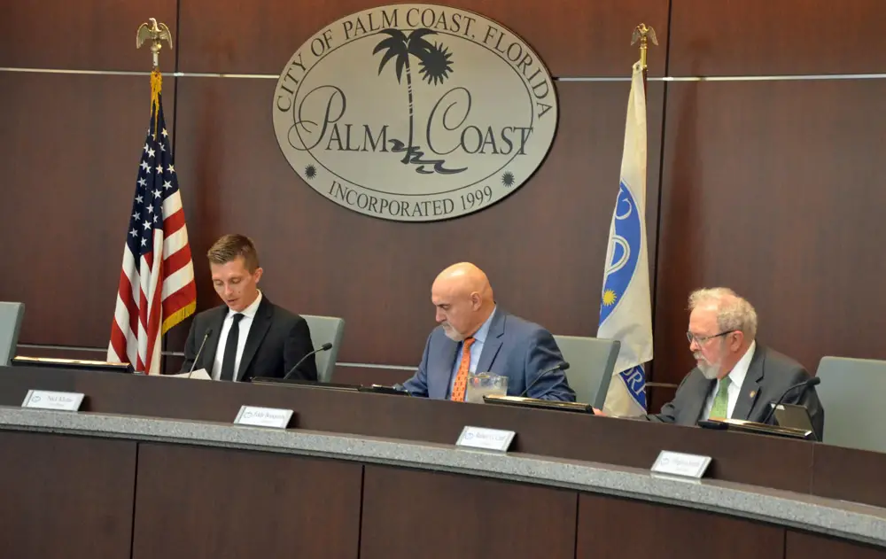 Palm Coast City Council member Nick Klufas, who chaired Wednesday's public hearing, repeatedly attempted to correct misconceptions about the city's tax rate and the size of its budget, with limited success. (© FlaglerLive)