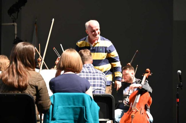 Kuchar, a very physical, vocal conductor who danced, stomped, directed with a voice as big as his gestures  but seemed always jovial and genial. (© FlaglerLive)