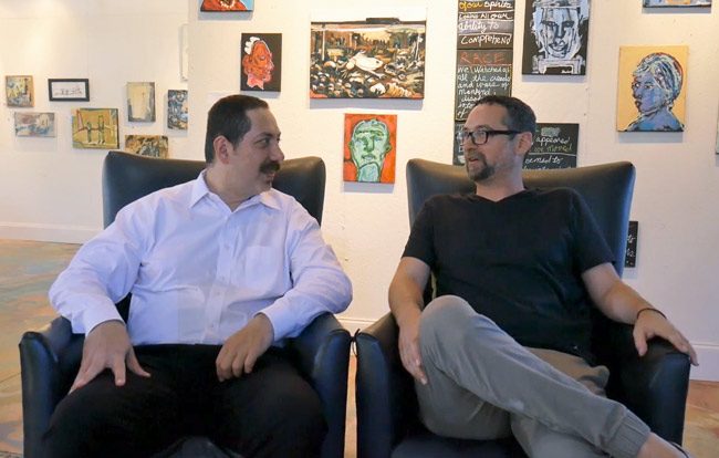 The art of entrepreneurial synergy: Office Divvy's Ky Ekinci, left, with Salvo Art Project's JJ Graham, at Graham's gallery. See the video of their conversation below.