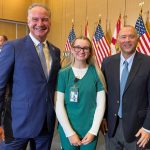 Second year Nursing student and Halifax Health monitor tech Alexis Marie Shay with Daytona State College President Dr. Tom LoBasso (right) and Halifax Health President and CEO Jeff Feasel.