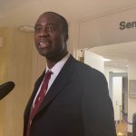 Dr. Joseph Ladapo talks to reporters after the Florida Senate confirmed him as state surgeon general on Feb. 23, 2022. (Photo by Imani Thomas/Florida Phoenix)