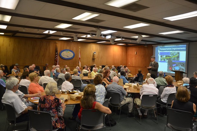 Some 90 people turned up for Palm Coast City Manager Jim Landon's Lunch 'n Learn presentation at the Community Center this morning. (© FlaglerLive)