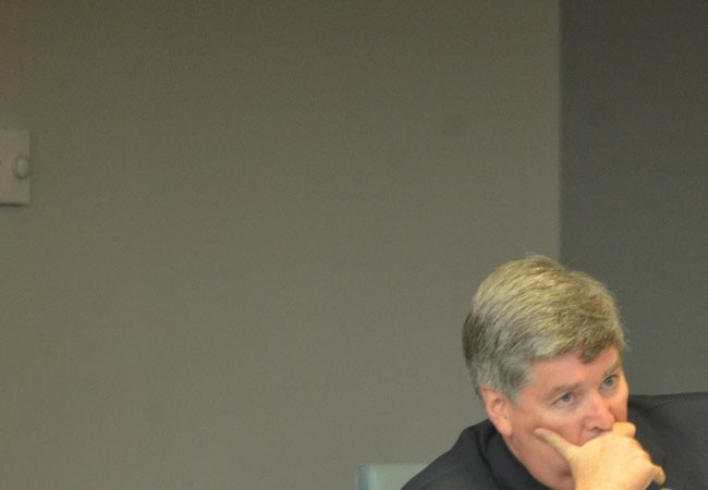 Palm Coast Manager Jim Landon will not be at the table when the council considers his fate at an Aug. 3 special workshop at City Hall. (© FlaglerLive)