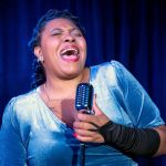 Laniece Fagundes portrays legendary jazz singer Billie Holiday in City Repertory Theatre’s production of “Lady Day at Emerson’s Bar and Grill.” (Mike Kataif)
