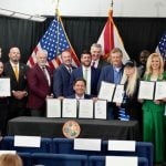 Gov. Ron DeSantis and numerous law enforcement officials at the signing of numerous bills in Winter Haven today. 9Facebook)