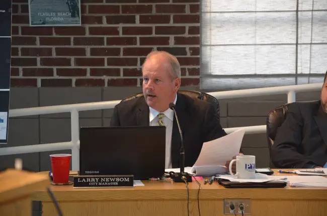 Flagler Beach City Manager Larry Newsom's tenure has been defined by Hurricane Matthew, a challenge he met head on. The commission today signaled its intention ton reward him substantially. (© FlaglerLive)