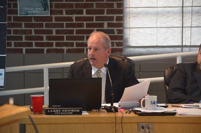 Flagler Beach City Manager Larry Newsom's tenure has been defined by Hurricane Matthew, a challenge he met head on. The commission today signaled its intention ton reward him substantially. (© FlaglerLive)