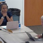 Acting Superintendent LaShakia Moore, left, at today's workshop of the Flagler County School Board. Board attorney Kristy Gavin walked the board through its next steps in its search for a new superintendent, including salary ranges and job description. (© FlaglerLive via Flagler Schools)