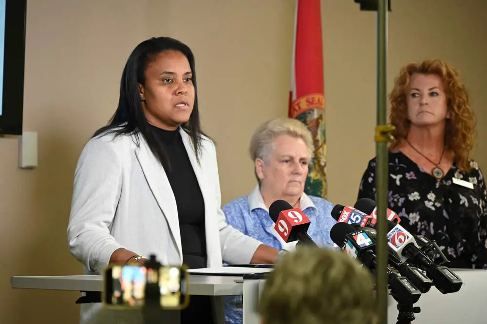 Interim Superintendent LaShakia Moore has taken a commanding role in her response to the segregation assembly at Bunnell Elementary last week. She was flanked by the entire membership of the school board at a news conference this morning, with Chair Cheryl Massaro and Collen Conklin, above. (© FlaglerLive)