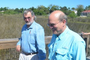 Carl Laundrie, left, and County Attorney Al Hadeed. (© FlaglerLive)