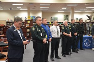 School district spokesman Jason Wheeler, left, aside, there were almost as many law enforcement officers in attendance as reporters. Click on the image for larger view. (© FlaglerLive)