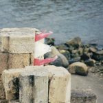 Remains of a Lebanese flag on the Chateau de la mer--the Castle of the Sea--the ruin of a Crusader castle in the city of Saida, or Sidon, in South Lebanon. (© Pierre Tristam)