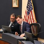 The much-diminished Flagler County Legislative Delegation took its seats for the first time this afternoon in Bunnell, cautioning of a new, poorer day in Tallahassee: Sen. Tom Leek, left, and Rep. Sam Greco. Both are Republicans, each in his first term, though Leek brings eight years of service in the House, where he rose to the appropriations committee chairmanship before he was term-limited. (© FlaglerLive)