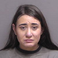 Leigha Mumby's booking photo at the Flagler County jail last July.