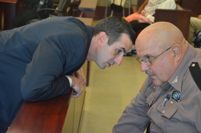 Assistant State Attorney Jason Lewis, who prosecuted the case, left, with Cpl. Pete Young, the Florida Highway Patrol Traffic Homicide Investigator who handled the case, and who testified today. (c FlaglerLive)