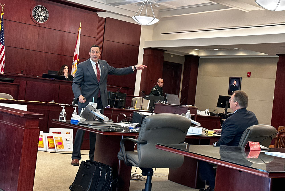 The better prosecutors pack lethal arguments, not guns. Above, Assistant State Attorney Jason Lewis, left, and Assistant State Attorney Mark Johnson during a February trial at the Flagler County courthouse before Circuit Judge Dawn Nichols. (© FlaglerLive)