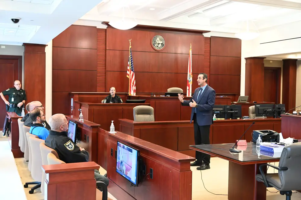 Assistant State Attorney jason Lewis addressing five new recruits for the Flagler County Sheriff's Office and the Flagler Beach Police Department last Friday on courtroom conduct during trials. He had blunt words for the recruits. (© FlaglerLive)
