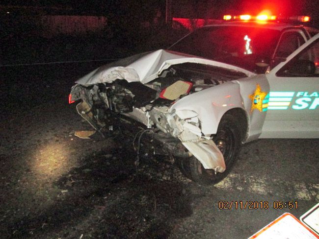 Flagler County Sheriff's deputy David Lichty's patrol vehicle, a Crown Victoria, after the crash on Belle Terre Parkway early Sunday morning. (FCSO)