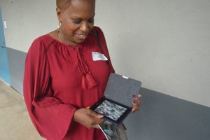 Always a reader, NAACP leader Linda Sharpe-Matthews packs a high-caliber Kindle. Click on the image for larger view. (© FlaglerLive)