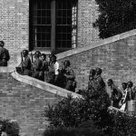 Soldiers from the 101st Airborne Division escort the Little Rock Nine students into the all-white Central High School in Little Rock, Ark.