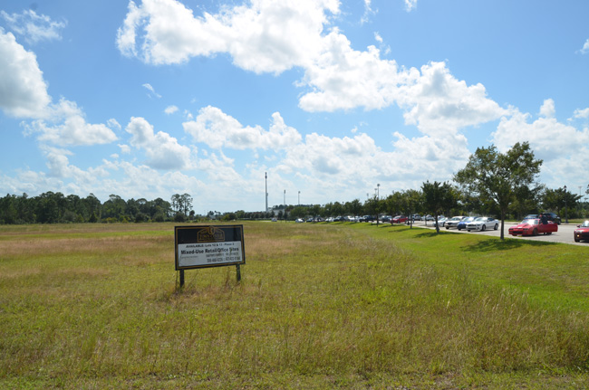 The three-building, 88-unit apartment complex will go up within sight of Flagler Palm Coast High School to the south and Palm Coast City Hall to the north. (c FlaglerLive)
