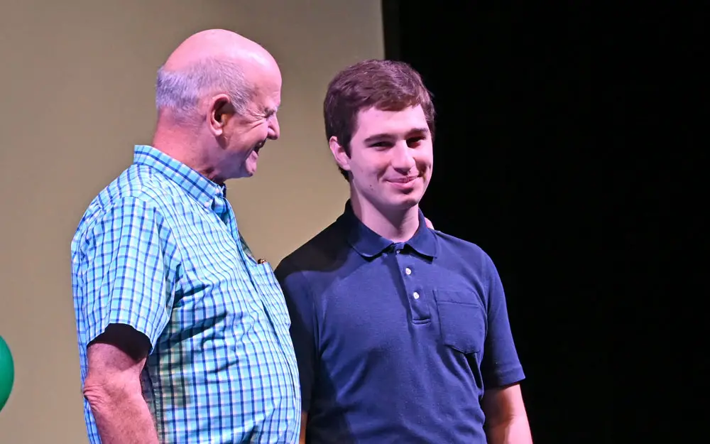 Mentor Peter Sutcliffe and Dylan Long, a senior at Flagler Palm Coast High School and one of just six Leader for Life fellows this year. (© FlaglerLive)