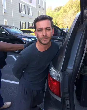 Bryan Loveland as he was being arrested in North Carolina by U.S. Marshals. (U.S. Marshal Service)