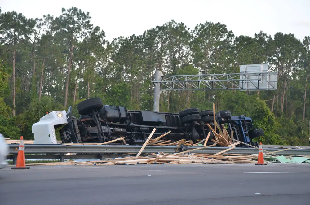 Mario Joseph Bizier 's truck after the crash, its headlights still on. (© FlaglerLive)