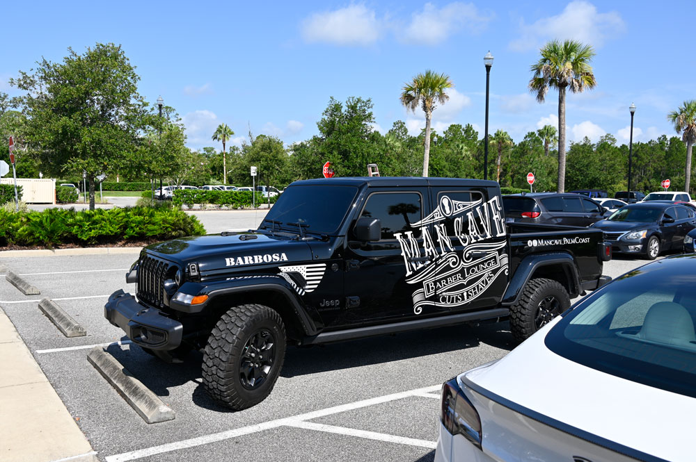 Former Palm Coast City Council member Victor Barbosa's "Man Cave" car, previously barred from parking in residential driveways, will soon be as free to park in those driveways as it once did at City Hall. (© FlaglerLive)