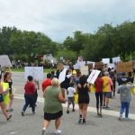 The march in Palm Coast drew upwards of 200 people. Another was held in Flagler Beach later in the day. (© FlaglerLive)