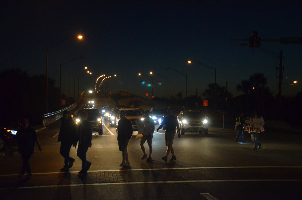 Marchers heading to a vigil at veterans P{ark in Flagler Beach in March 2018, after the massacre at the high school in Parkland. A vigil is planned Friday, after the massacres in Buffalo and (© FlaglerLive)