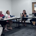 From right, Marineland Mayor Dewey Dew and Jessica Finch, with Town Planner Janis Fleet and Town Manager Suzanne Dixon. (© FlaglerLive)