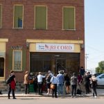 Reporters interview Eric Meyer outside of the Marion County Record office in Marion, Kansas, the site of a 2023 police raid, after an Oct. 7, 2024, court hearing for Gideon Cody, the former Marion police chief who led the raid. Meyer and others reached agreements with the county Monday for its role in the raids. (Photo by Anna Kaminski/Kansas Reflector)