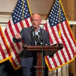 Arizona Democratic U.S. Sen. Mark Kelly speaks with reporters in the Mansfield Room of the U.S. Capitol on Monday, Dec. 1, 2025. (Photo by Jennifer Shutt/States Newsroom)