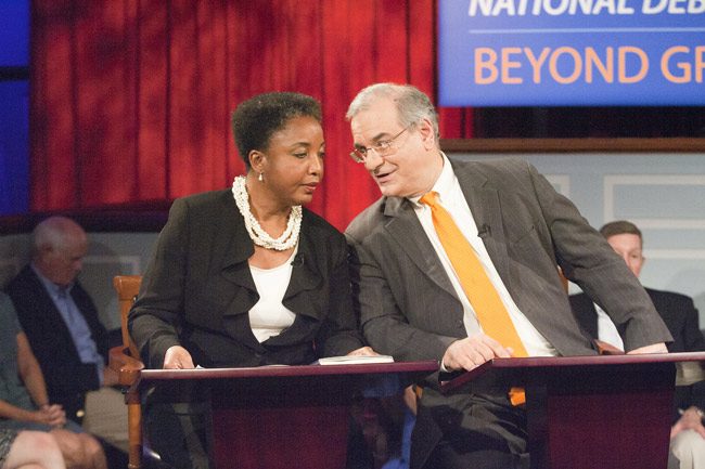 Mark Krikorian, the executive director of the Center for Immigration Studies, right, in an appearance at the University of Virginia's Miller Center in 2014. (Miller Center)