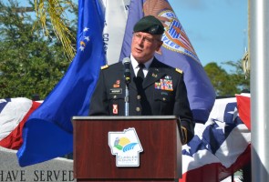 LtCdr. Mark Widener of the Florida Army National Guard delivered a keynote address that touched on conflicts and commemorations past and present. Click on the image for larger view. (© FlaglerLive)