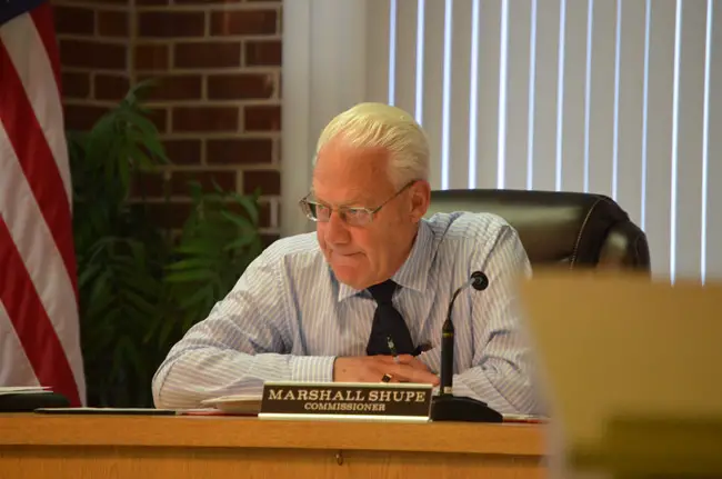Commissioner Marshall Shupe was absent this evening, so the Flagler Beach City Commission voted 3-1 to delay its second reading of a proposed ban on medical pot dispensaries until August 10. (© FlaglerLive)