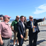 Flagler Beach City Manager Dale Martin, right, had invited Waltz to survey the renourishment project's progress and hear about the pier reconstruction project. Left is Flagler Beach City Commissioner Rick Belhumeur. (© FlaglerLive)