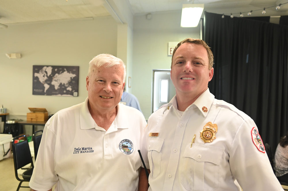 Flagler Beach City Manager Dale Martin, left, appointed Stephen Cox Flagler Beach's fire chief following a unanimous recommendation from a three-member independent board. (© FlaglerLive)