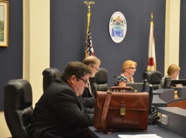 Martinez, with his briefcase on the desk throughout the meeting this evening, looked ready to go. (© FlaglerLive)