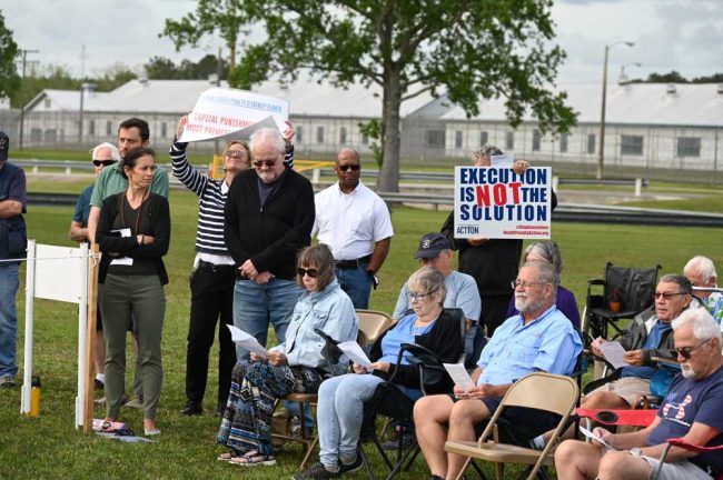 Among the opponents. Executive Director of Floridians for Alternatives to the Death Penalty Maria DeLiberato is standing to the left. (© FlaglerLive)