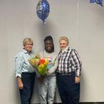 Remy Battles, center, with former School Board member Cheryl Massaro, right, and ...