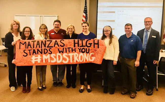 'It's a solid day when some of the greatest students of all time attend the board workshop,' Superintendent Jim Tager tweeted on Tuesday after Matanzas High students Alicia Bermudez and Kelsey Sweeney joined the school board to hold up a banner their school had prepared for the students at Marjorie Stoneman Douglas High in Parkland. 