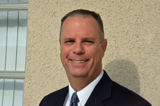 Flagler Beach Police Capt. Matt Doughney invites you for coffee and doughnuts today from 8 to 10 at the 7-11 in Flagler Beach. (© FlaglerLive)