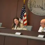 Mayor Milissa Holland anchored a 90-minute segment at Monday's Palm Coast City Council meeting, devoted entirely to refuting allegations about the city's relationship with Coastal Cloud, and the mayor's role. The mayor is a company employee. (© FlaglerLive)