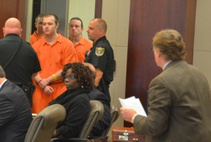 James McDevitt entering the courtroom Thursday afternoon, with his attorney, Michael Lambert, looking on from the right. McDevitt pleaded to a 15-year prison term. (c FlaglerLive)